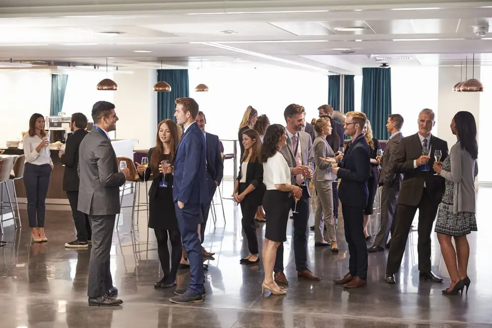 People interacting at an NYC networking event