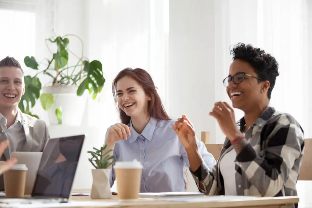 Happy employees interacting