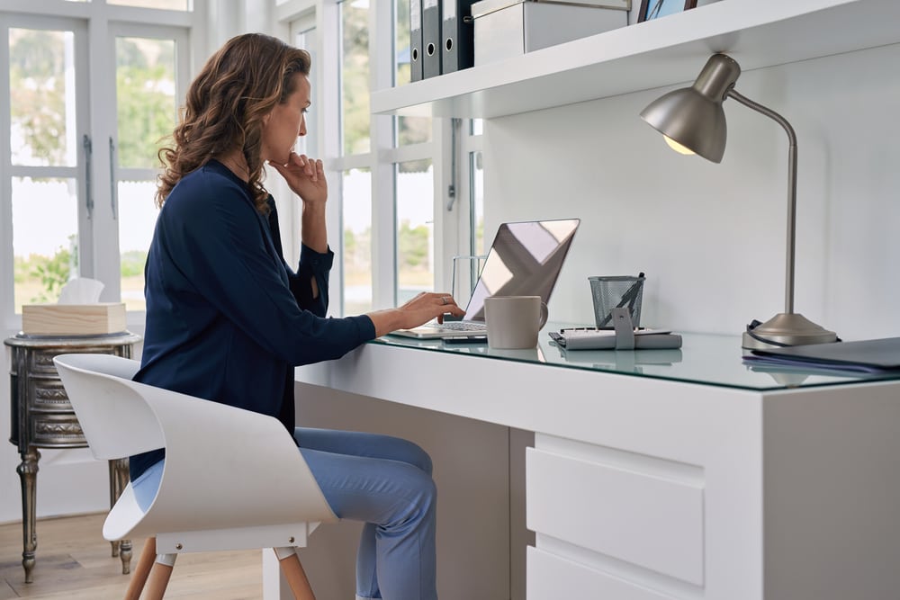 Female business professional working in a home office